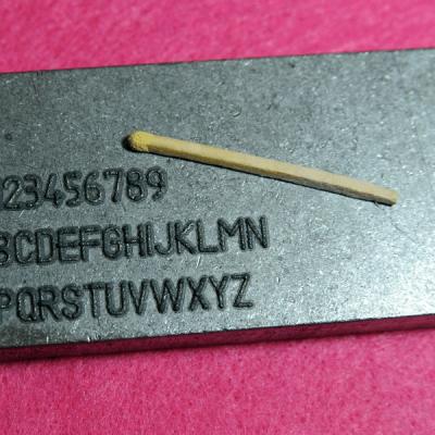 Aufgeschweißte Beschriftung